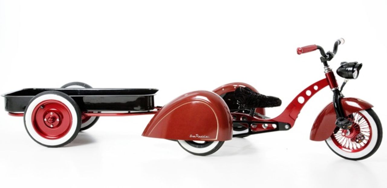 Barnvagn och trehjuling i ett