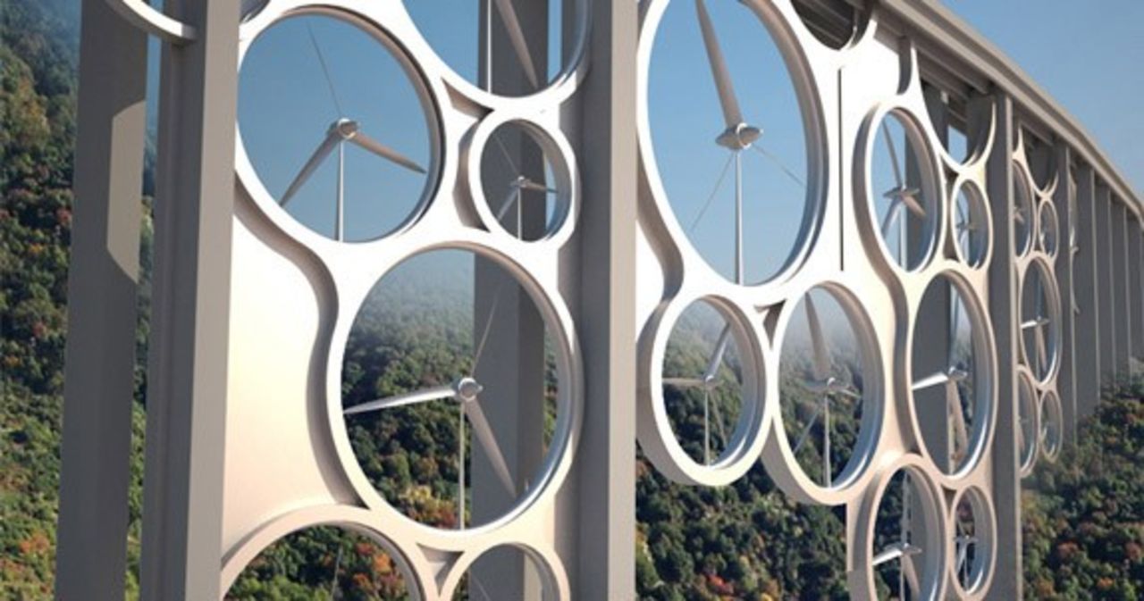 Bro och vindkraftverk i ett