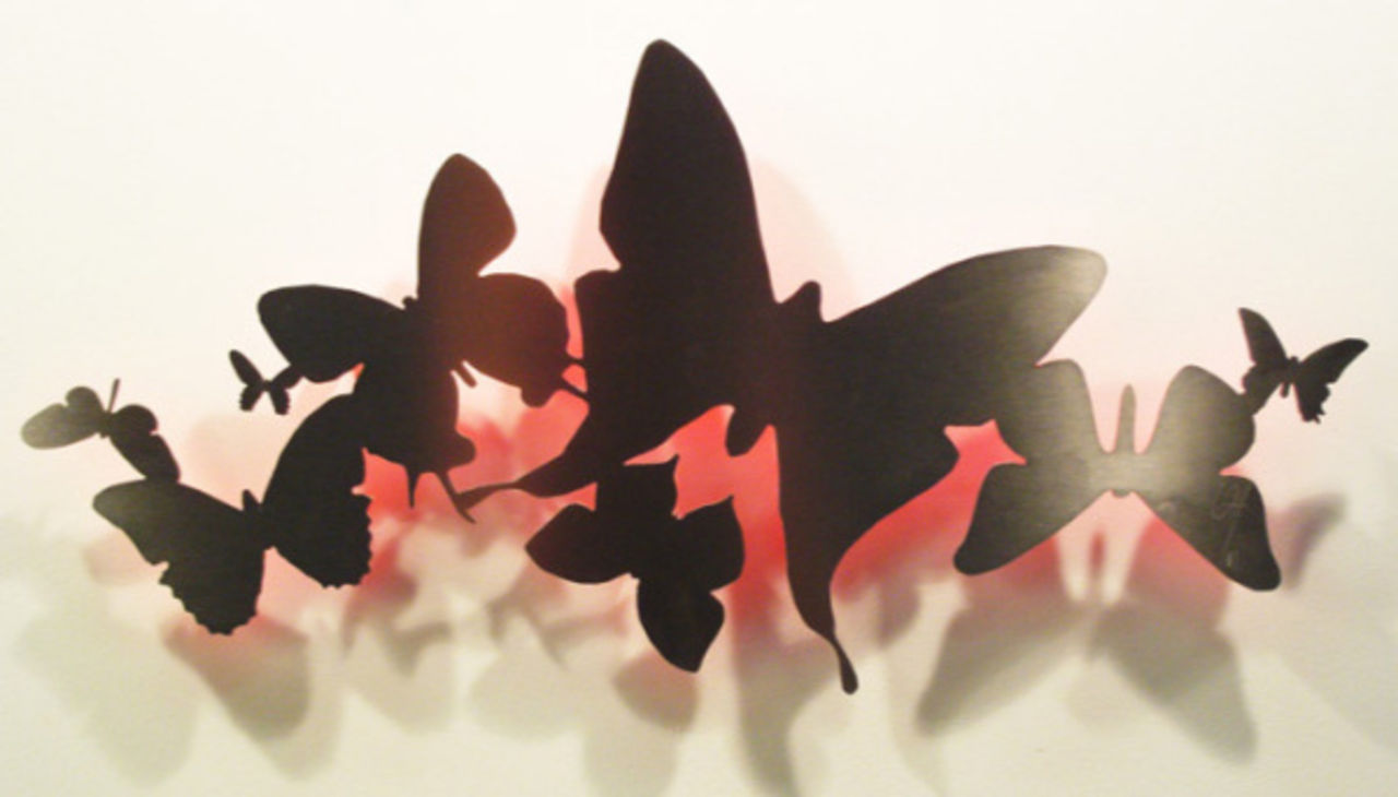 Låt fjärilarna dansa hemma på väggen