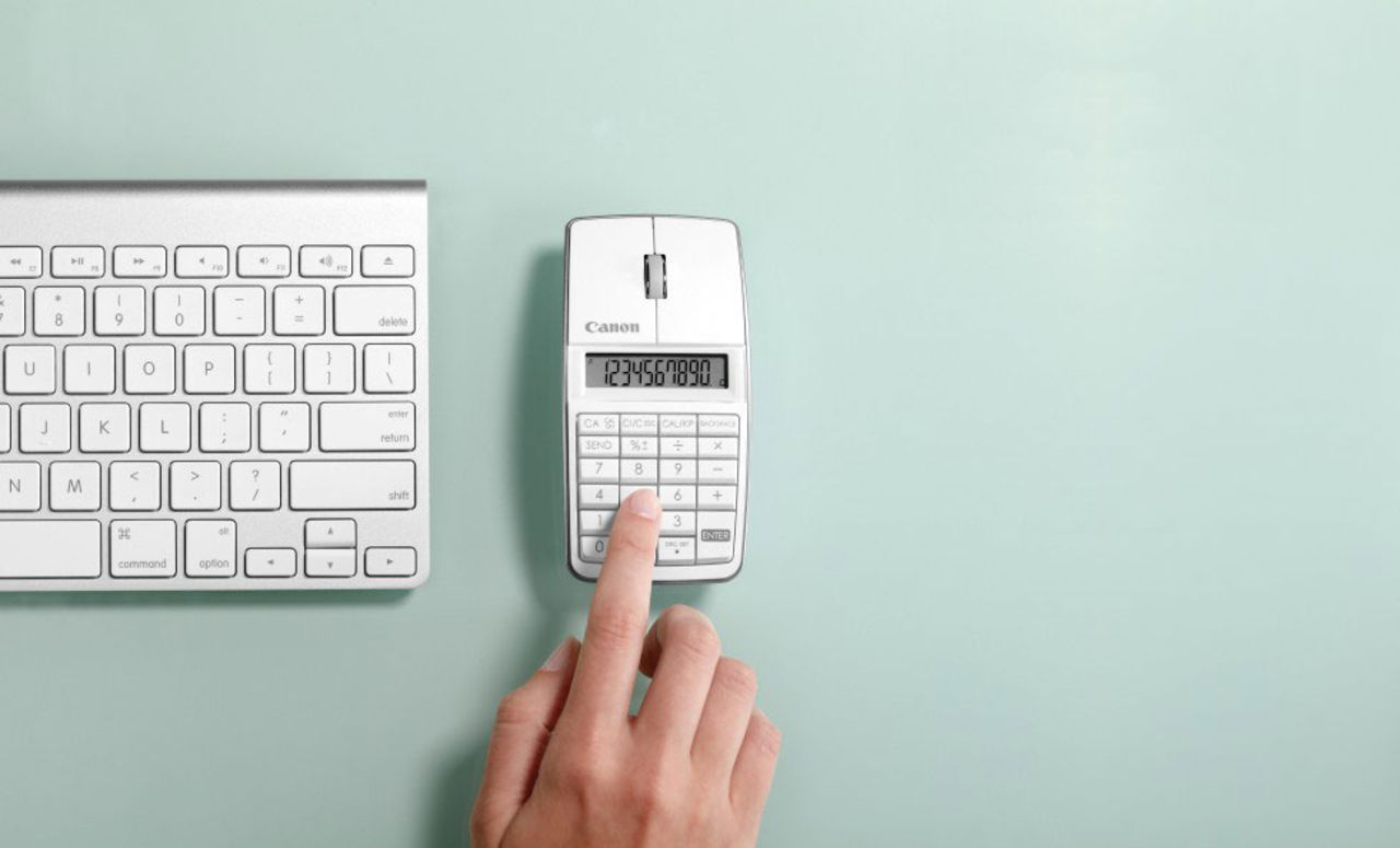 Mus, numeriskt tangentbord och miniräknare i ett