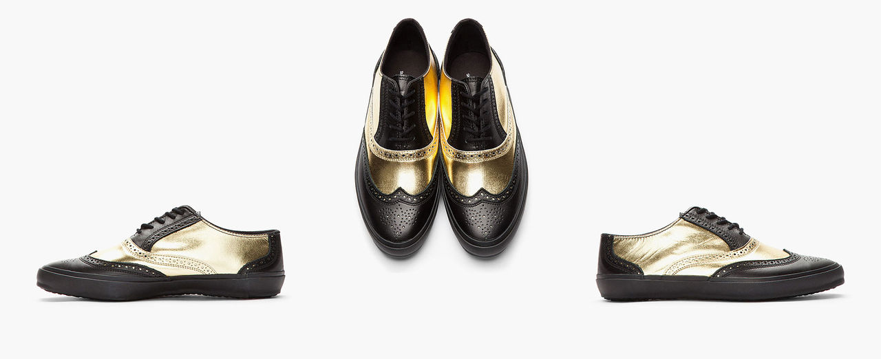 Dyra guldsneakers