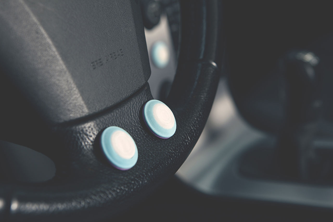 Styr telefonen med en Bluetooth-knapp