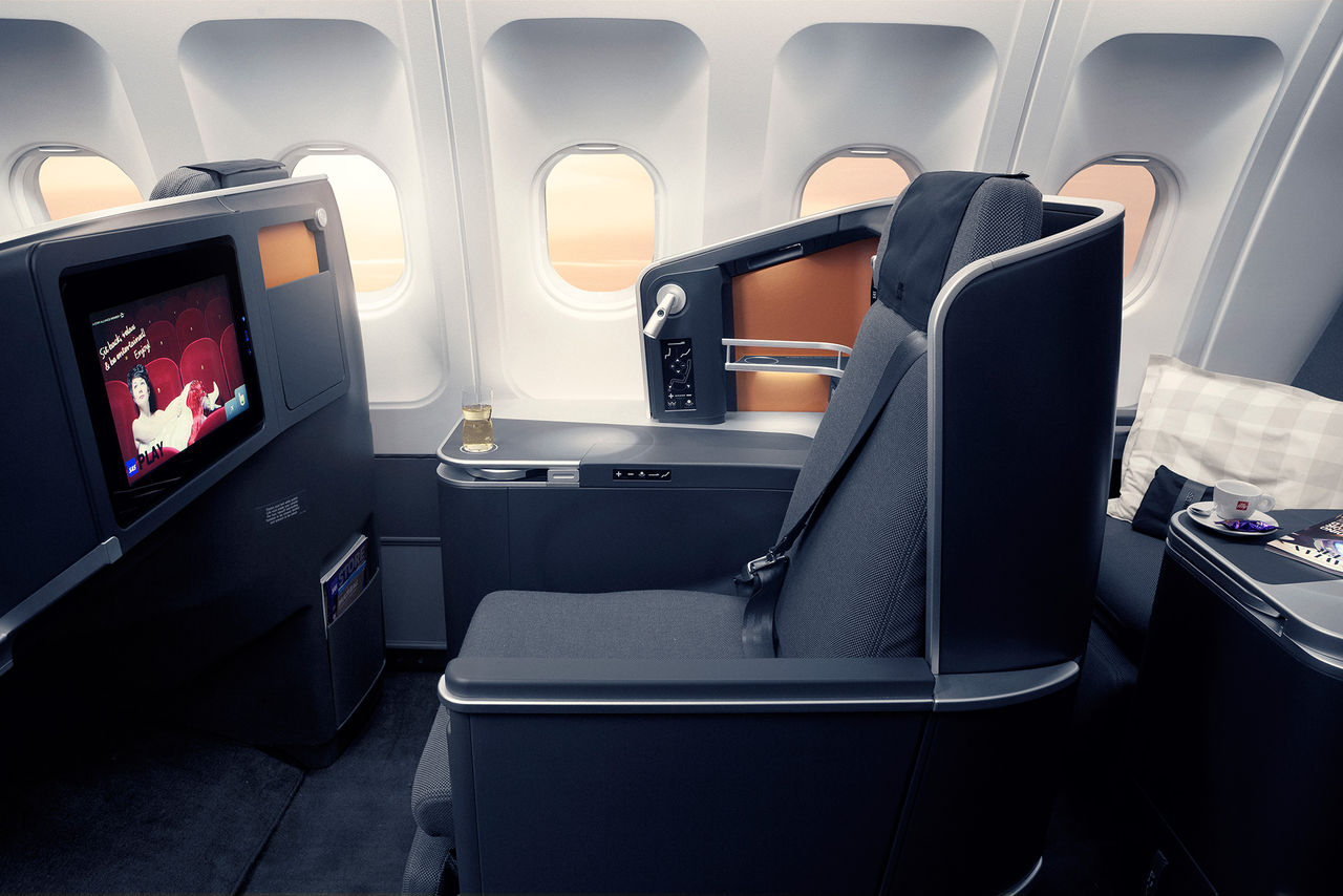 Lägg ett bud på flyg-uppgradering