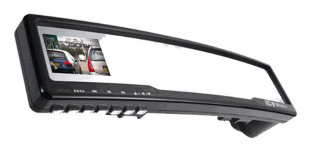 Backspegel som spelar in färden