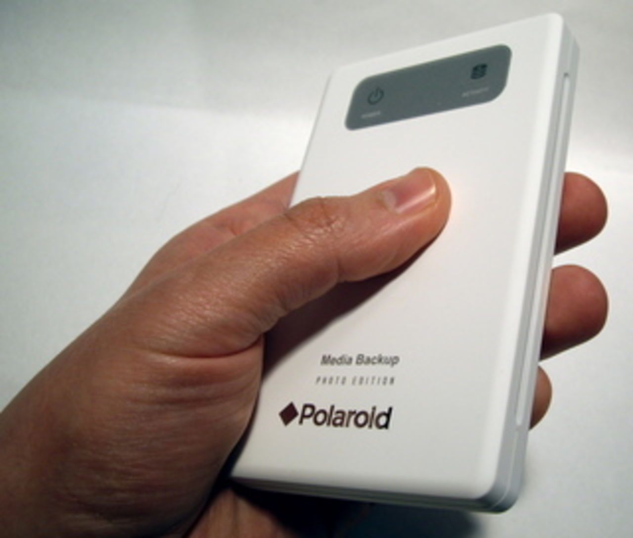 Backa upp bilderna med Polaroid