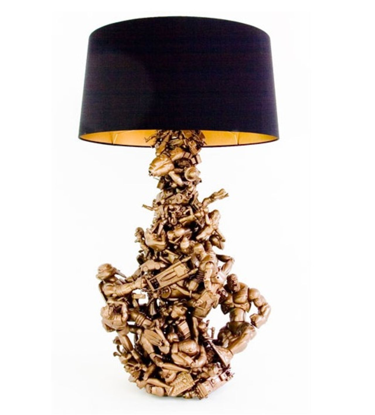 Lampfot av leksaker i guld