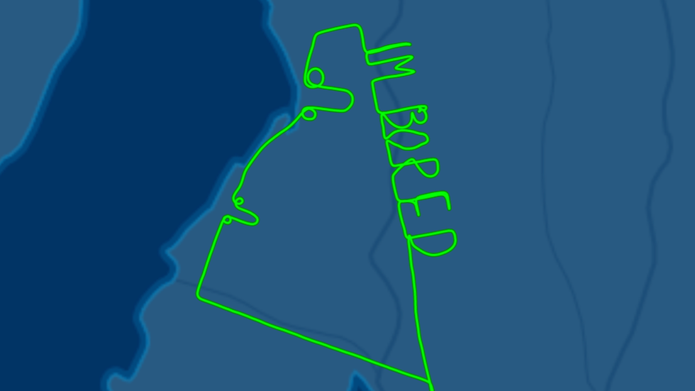 Uttråkad pilot ritar penisar i luften