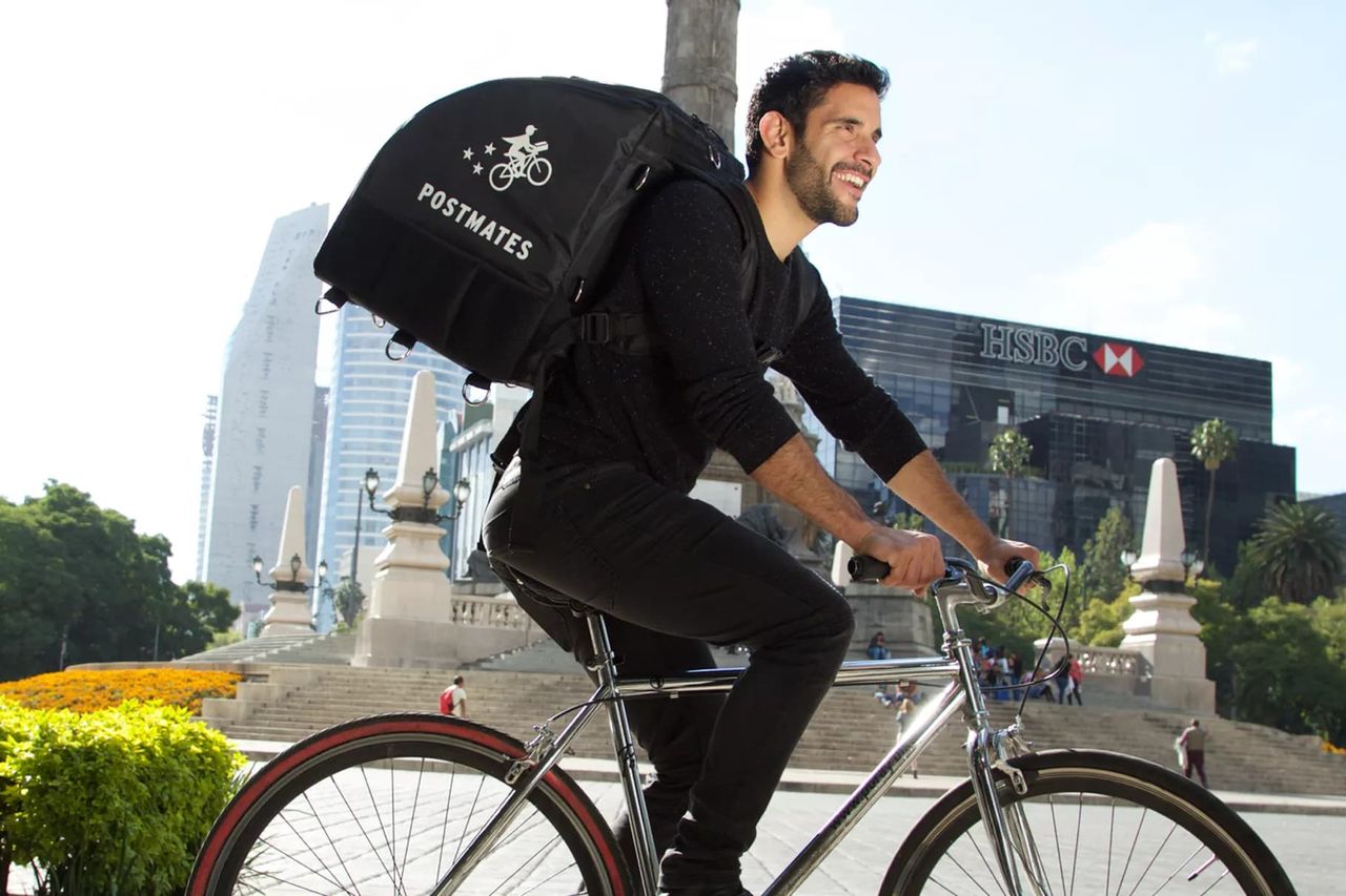 Uber köper Postmates