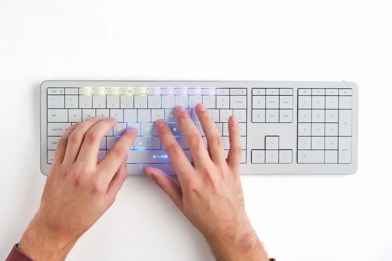 Mac-tangentbord med inbyggd jättestor styrplatta