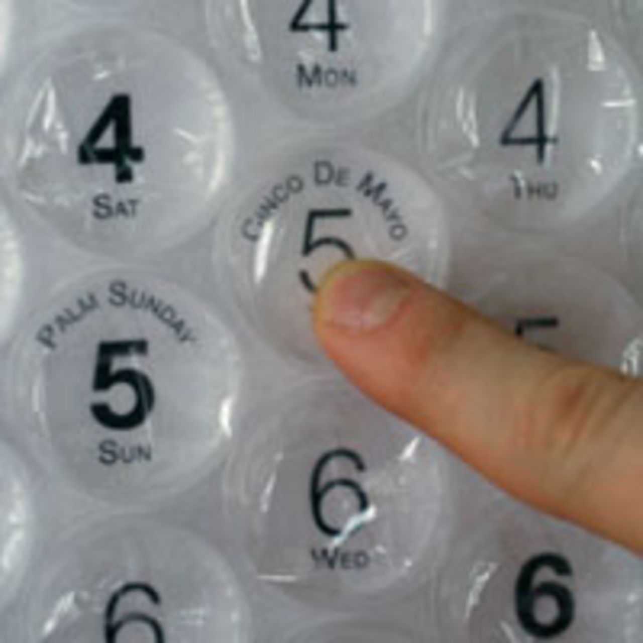Kalender i bubbelplast
