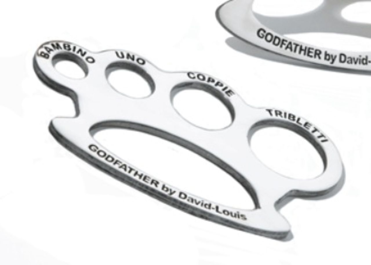 Spagettimått med form av knogjärn